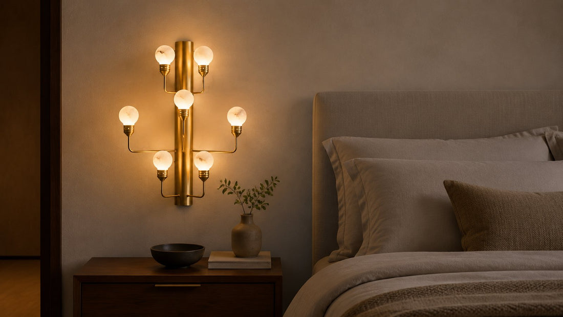 Alabaster wall sconce beside a warm bedroom setting