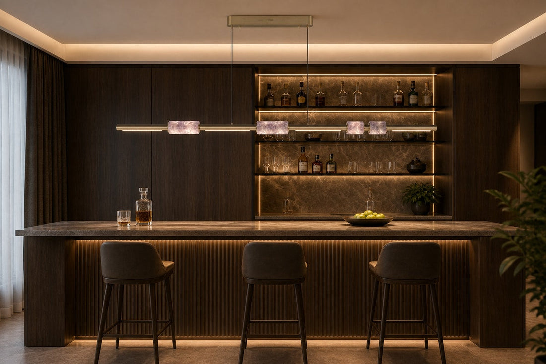 AI-assisted wide bar-counter scene with the exact ARDEN LUME linear crystal chandelier centered above a long stone surface.