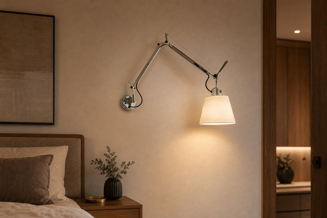 Modern Adjustable Swing Arm Wall Sconce in a warm reading nook with a chair and neutral interior styling.