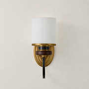 Ashbourne wall sconce clean hero with its complete backplate flush to the wall