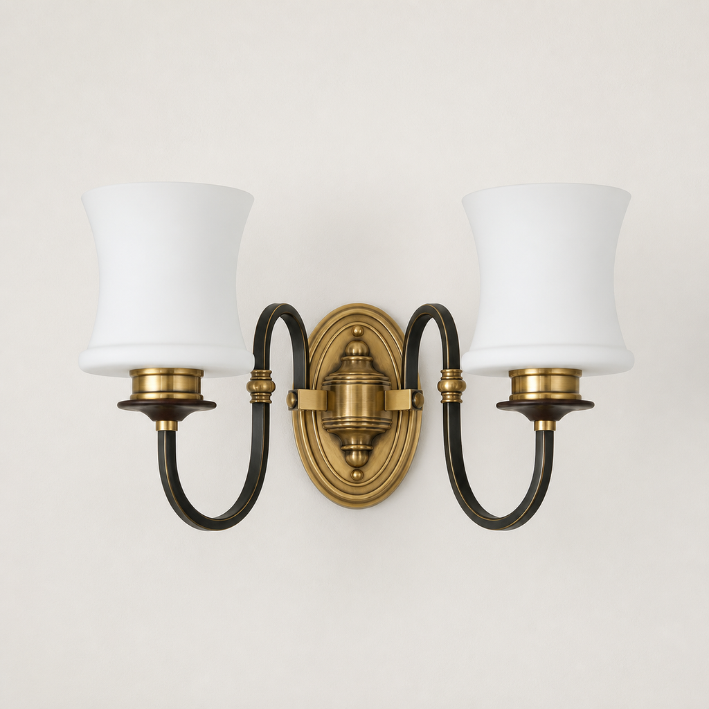 Ebonelle two-light wall sconce clean hero with its stepped wall plate flush to plaster