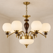 Orbemere Faceted Milk Glass and Ash Wood Chandelier complete installed product view with a finished ceiling and canopy