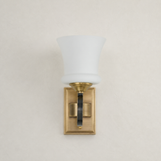 Rosethorne opal glass wall sconce clean hero mounted flush to a plaster wall