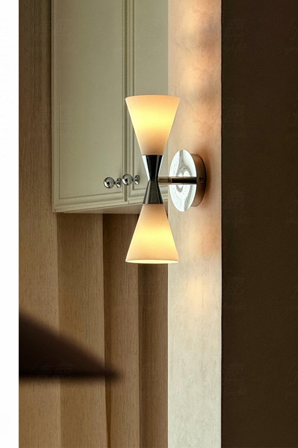 Harlekin Duo Wall Sconce polished chrome installed doorway scene