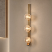 Modern Glass Globe Wall Sconce in Antique Brass - product image 01