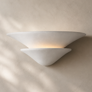 Sculptural Double-Tier Plaster Wall Sconce — product hero on a warm beige wall