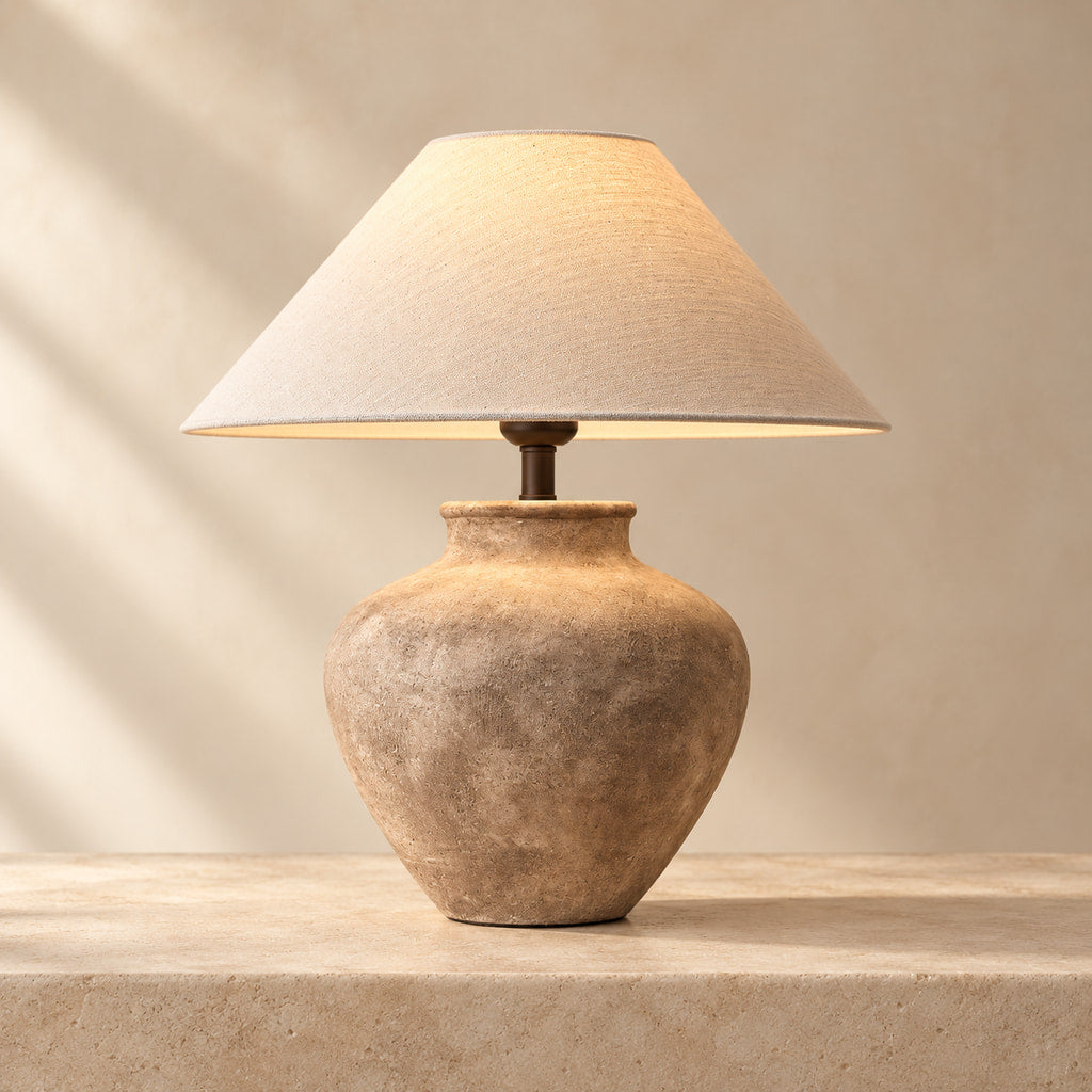 Taofou Wabi-Sabi ceramic table lamp on a warm beige stone surface