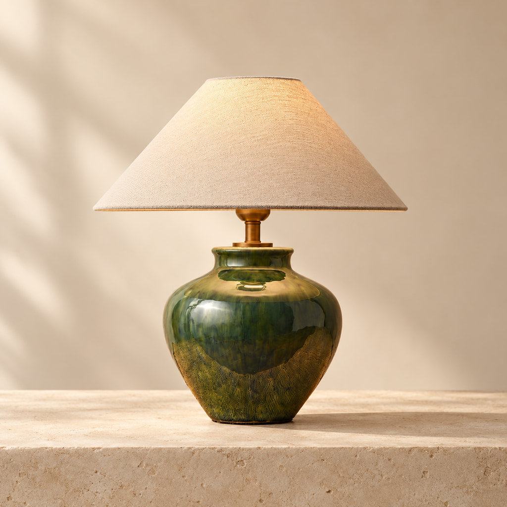 Taofou jade glaze ceramic table lamp on a warm ivory stone surface