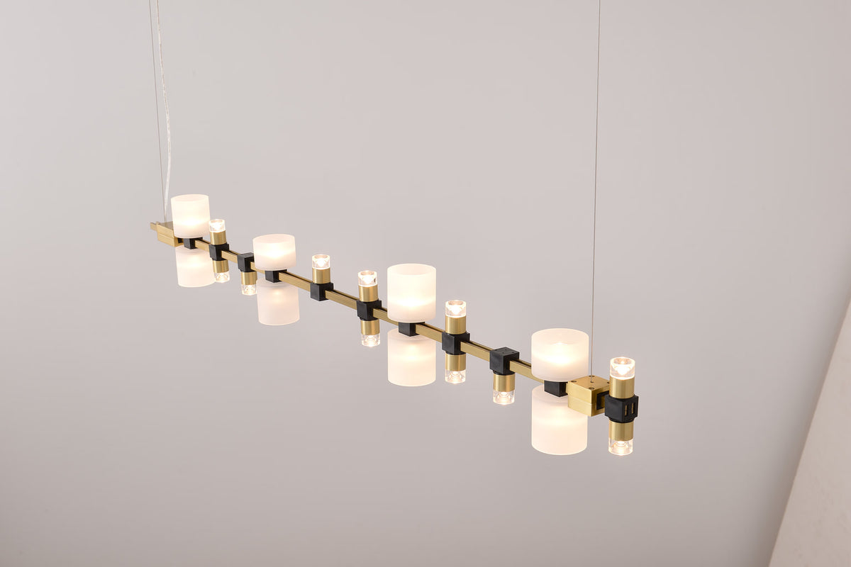 High-resolution real close view of the Royal linear pendant diffuser and brushed copper rail