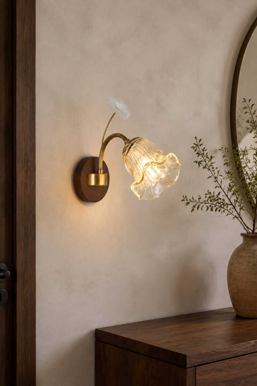 Lyravelle one-light flower glass wall sconce in a walnut-toned entry