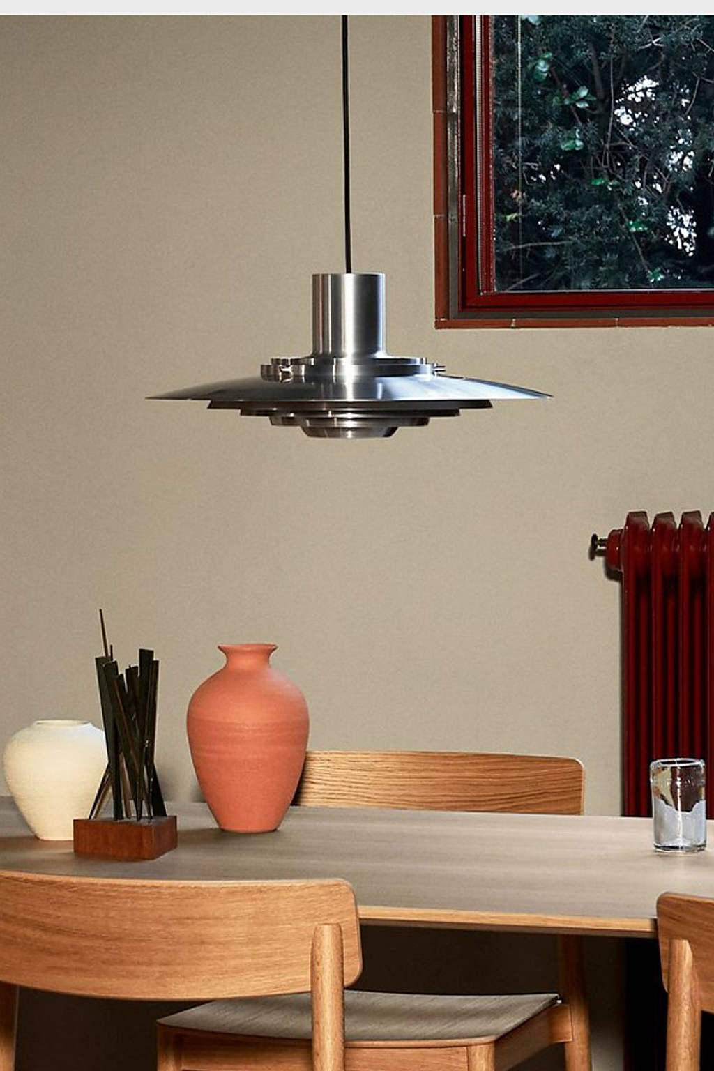 Layered Brushed Metal Pendant Light — brushed silver dining room scene