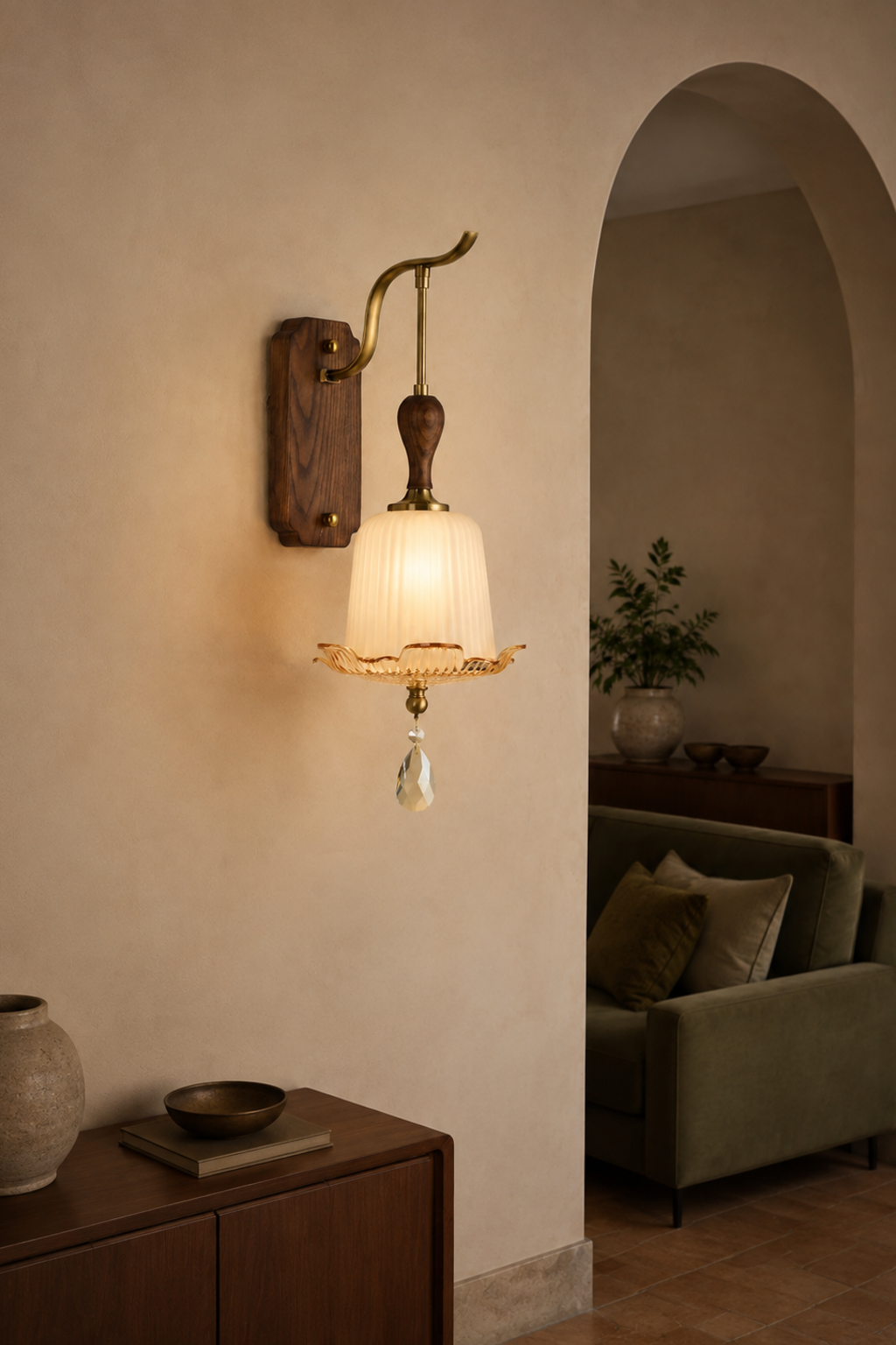 Virdelune tall fluted bell glass wall sconce illuminated in a warm residential interior