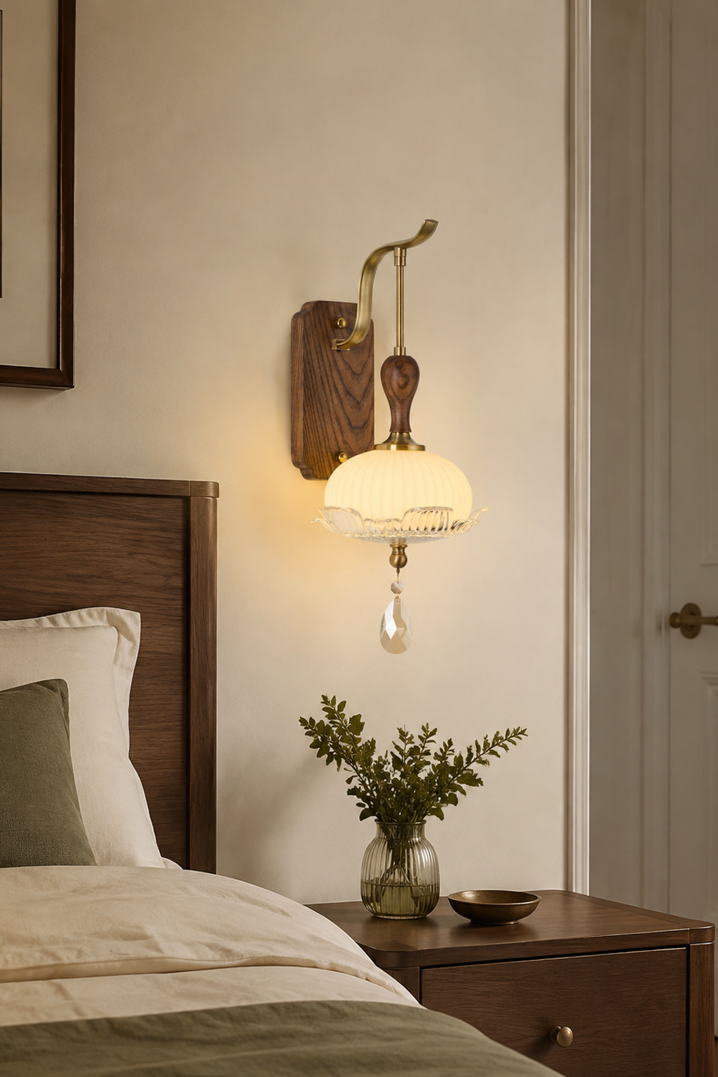Virdelune shallow fluted bowl wall sconce illuminated in a warm residential interior