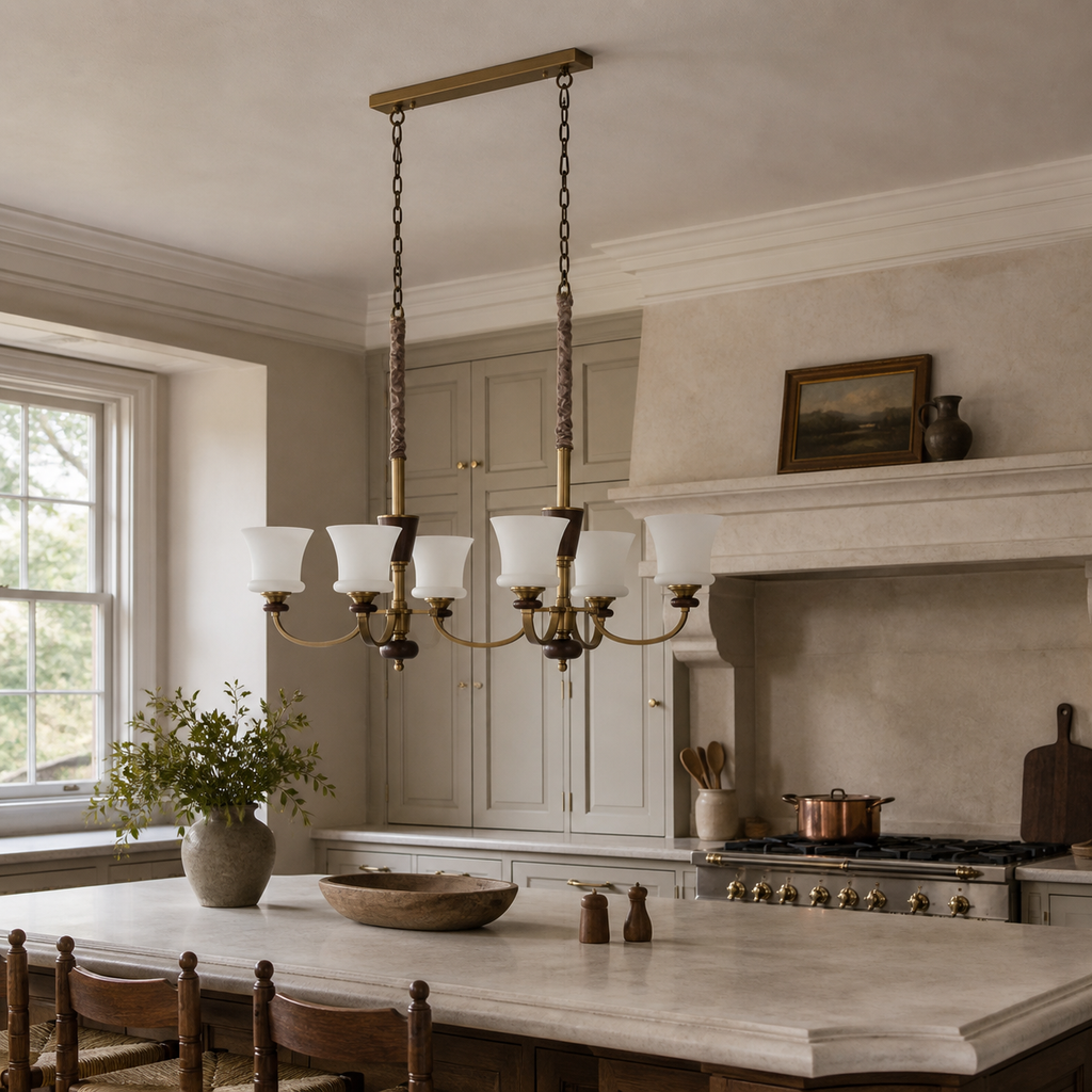 Caldrienne six-light linear chandelier unlit above a kitchen island