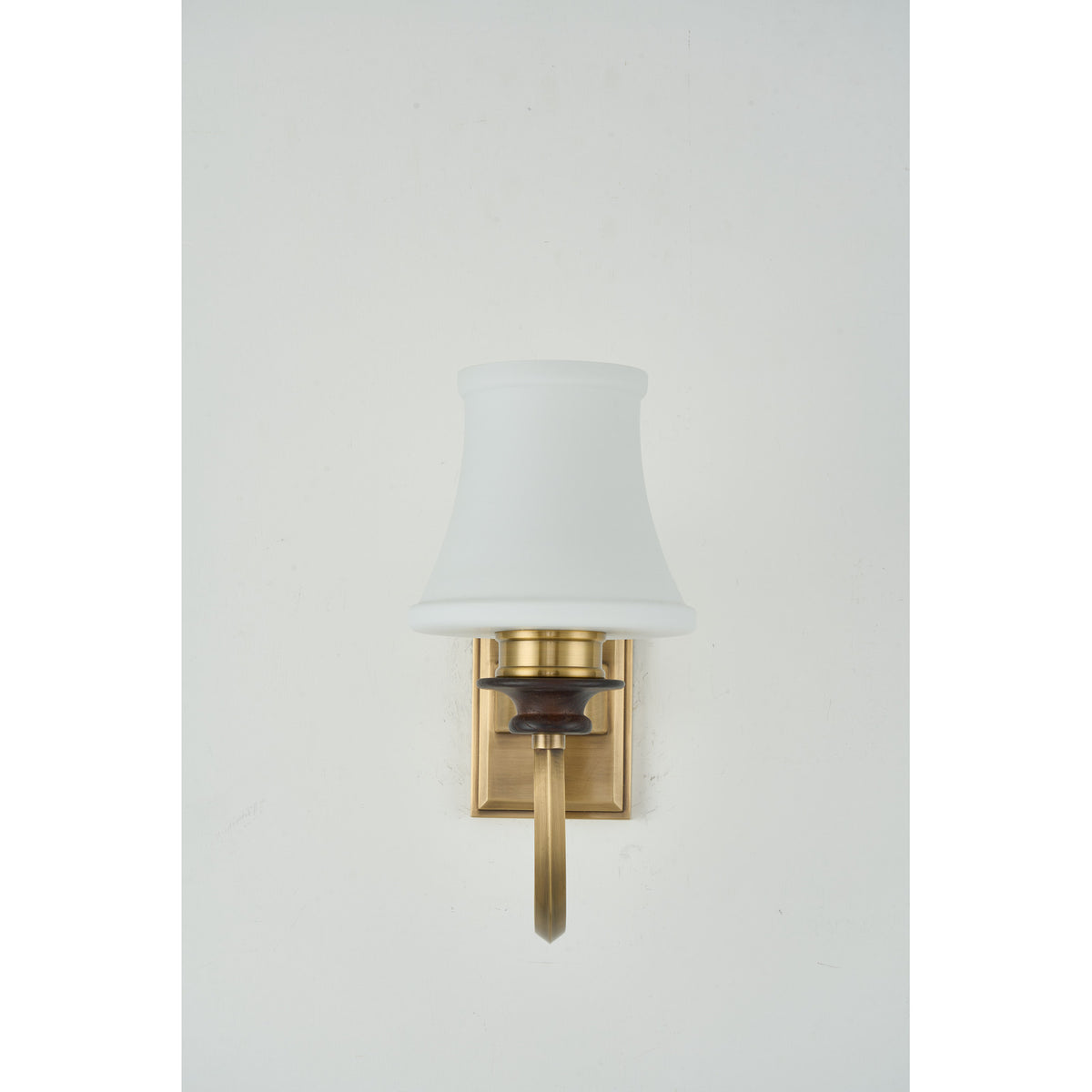 Supplier real photograph of the Kingswell one-light wall sconce complete unlit front view