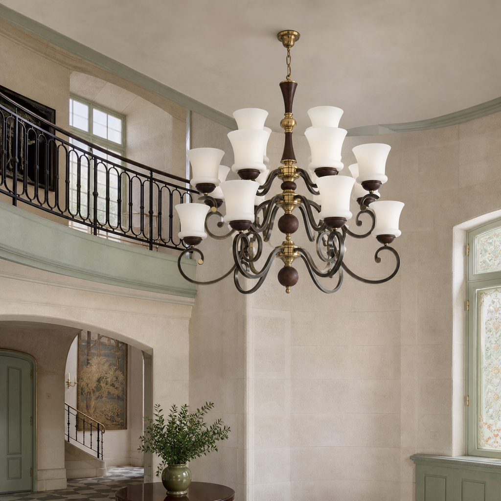 Unlit Langford fifteen-light two-tier chandelier in a double-height limestone gallery foyer with a flush ceiling canopy