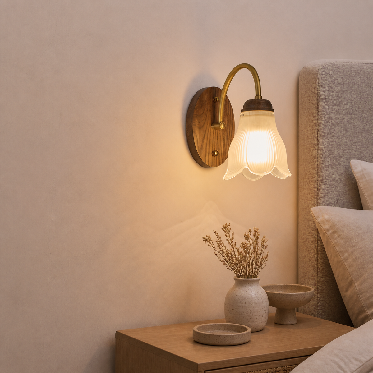 Ribbed bell glass and walnut wall sconce on the right in an apricot bedroom