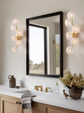 Modern Glass Globe Branch Wall Sconce in Natural Brass - 02 02-scene-natural-brass-glass-globe-wall-sconce-living-room