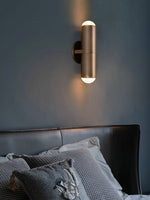 Modern Crystal Glass Cylinder Wall Sconce in Vintage Bronze - 02 02-scene-vintage-bronze-crystal-wall-sconce-bedroom