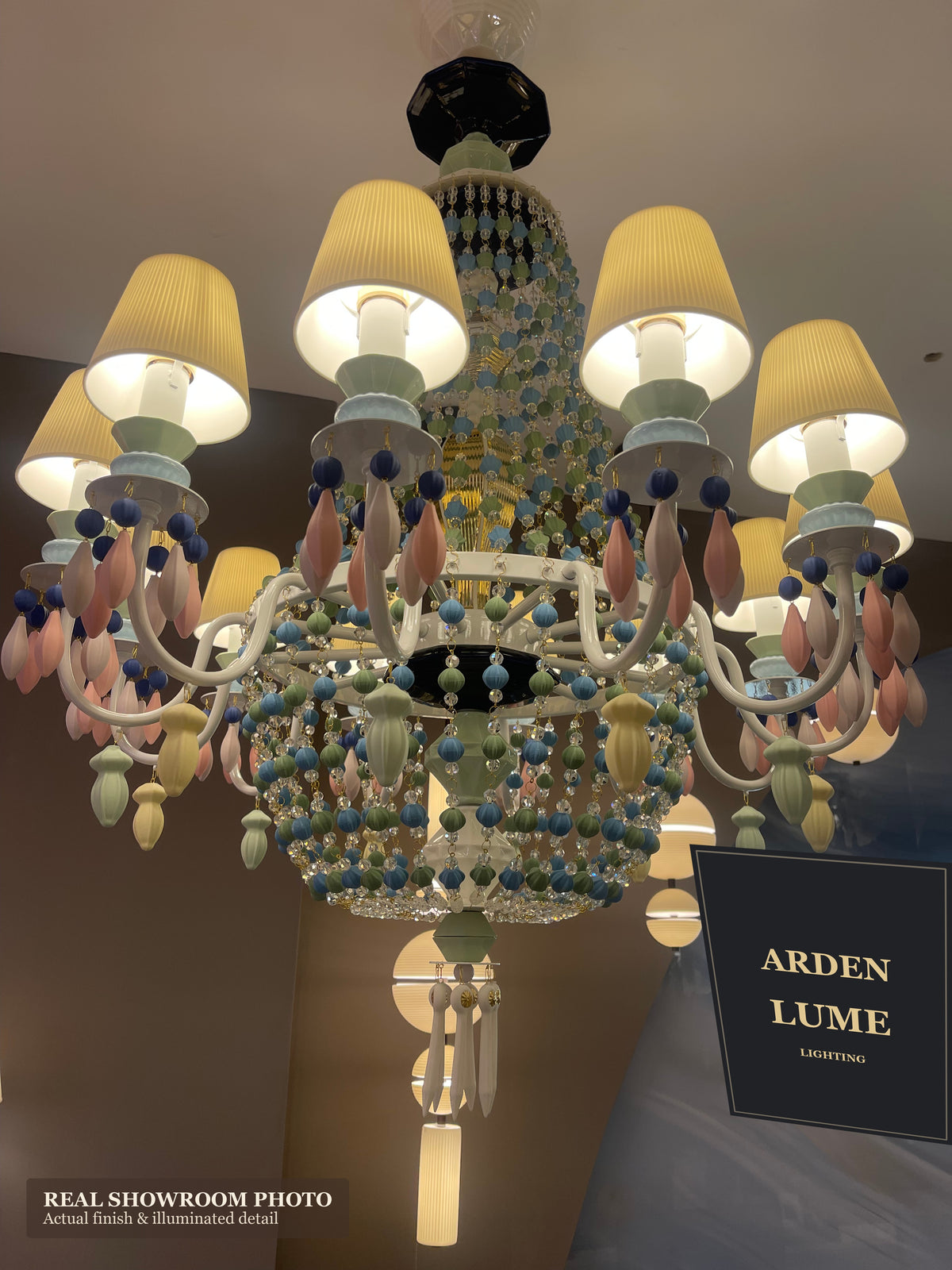 Ivorelle chandelier – labeled real showroom photo with ARDEN LUME background sign – media 10