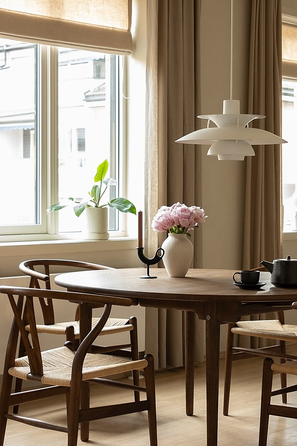 PH5 Layered Metal Pendant Light — white window dining scene