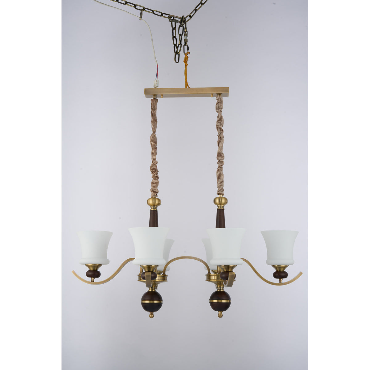Supplier real photograph of the unlit Brontelle six-light linear chandelier complete front view