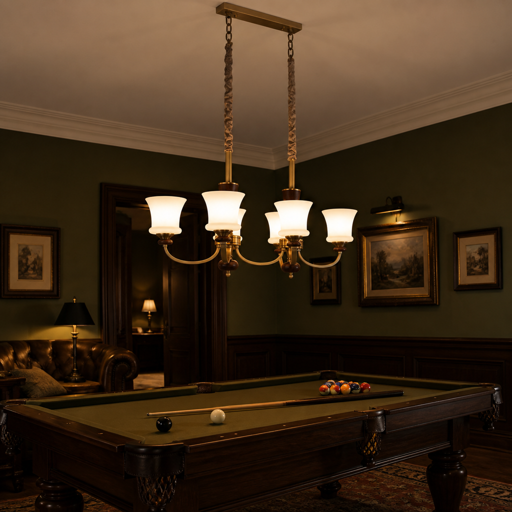 Caldrienne six-light linear chandelier illuminated above a billiards table