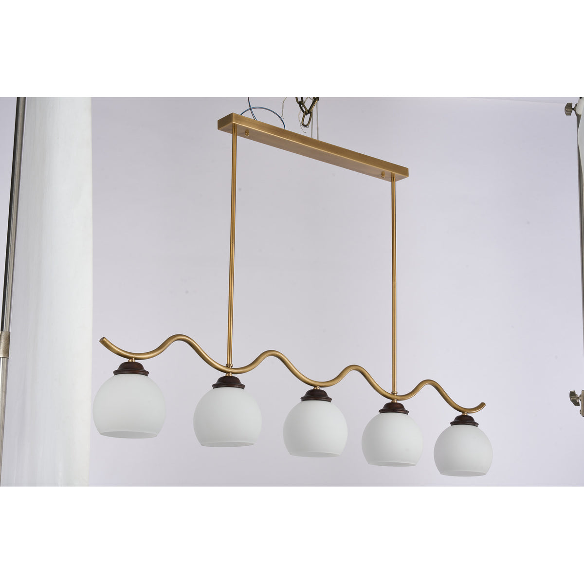 Supplier real photograph of the Ondervale five-light linear chandelier complete unlit front view
