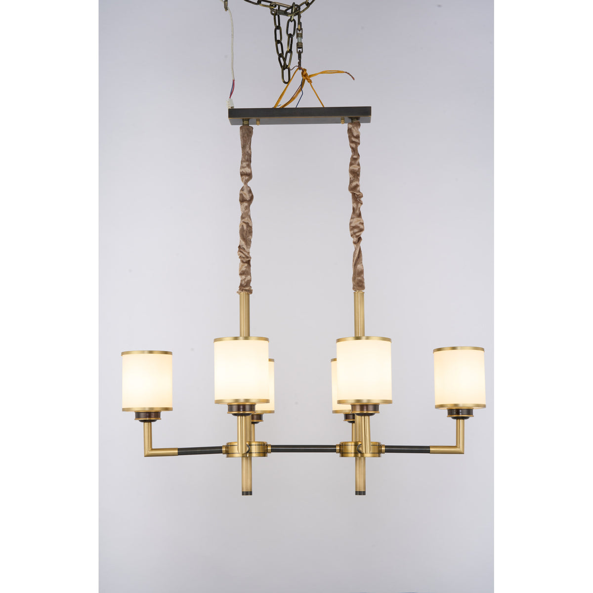Supplier real photograph of the Orseline six-light linear chandelier complete front view