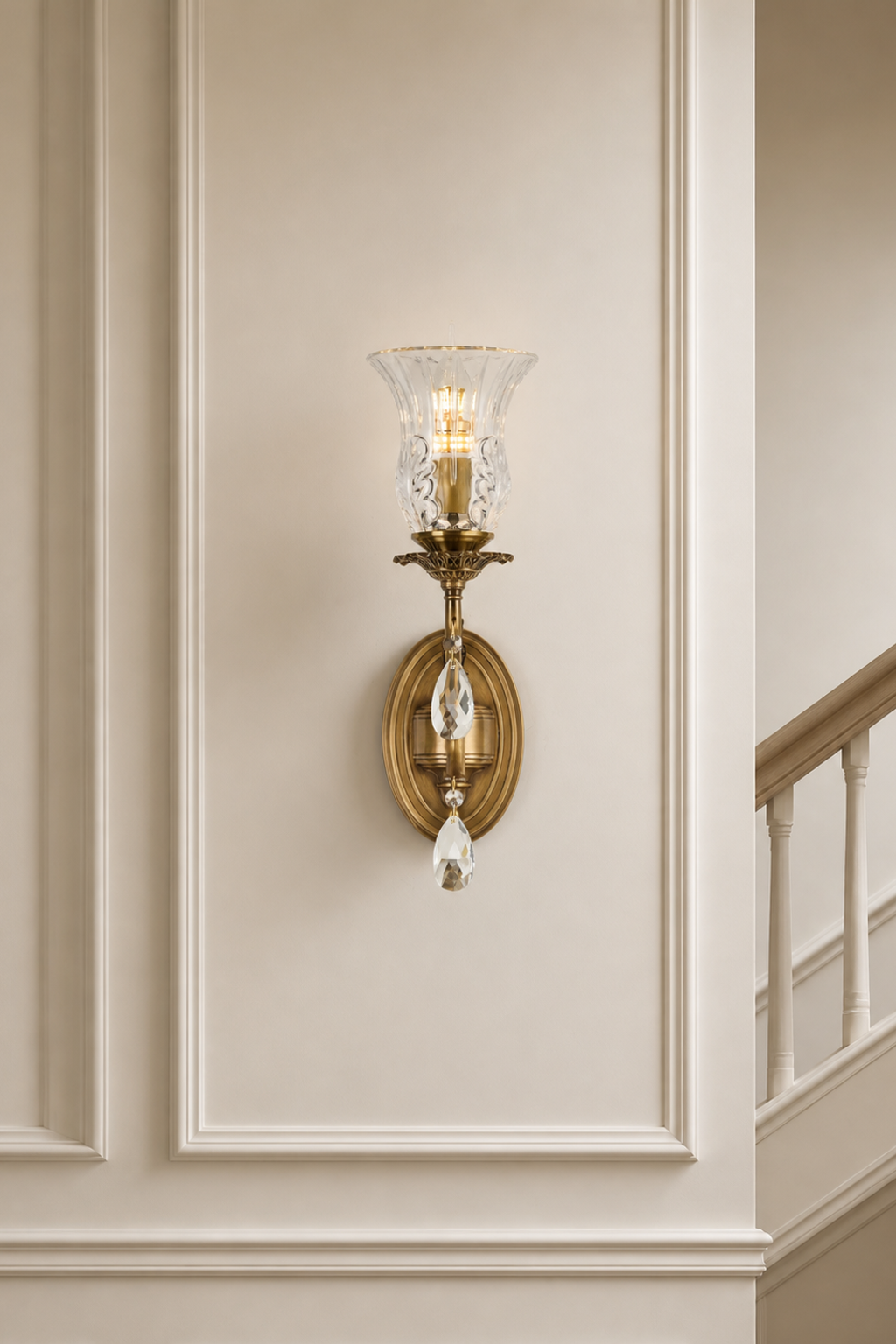 Vitrelaine one-light wall sconce highlighting clear glass, crystal and antique-brass-toned details