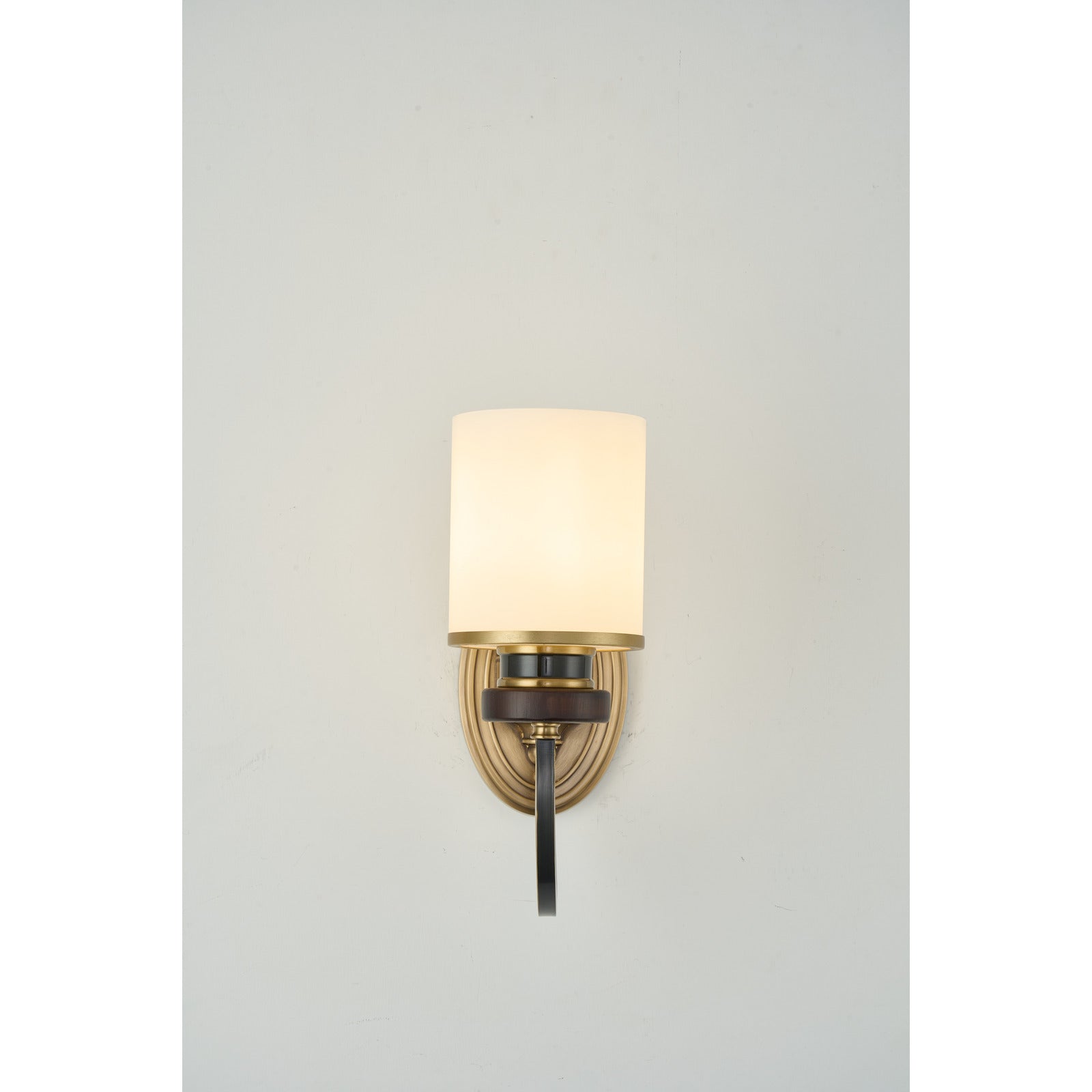 Supplier real photograph of the Ashbourne single-light wall sconce complete lit front view
