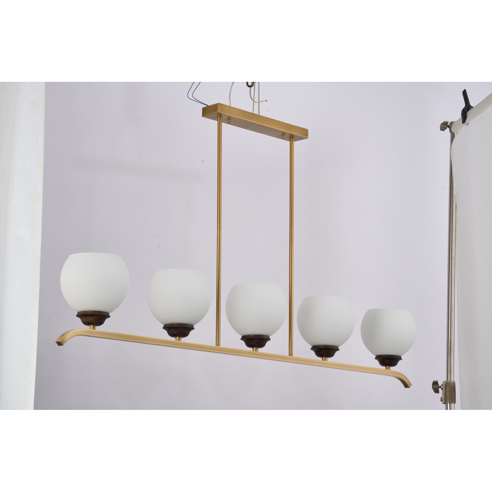 Supplier real photograph of the unlit Avelune five-light linear chandelier complete front view