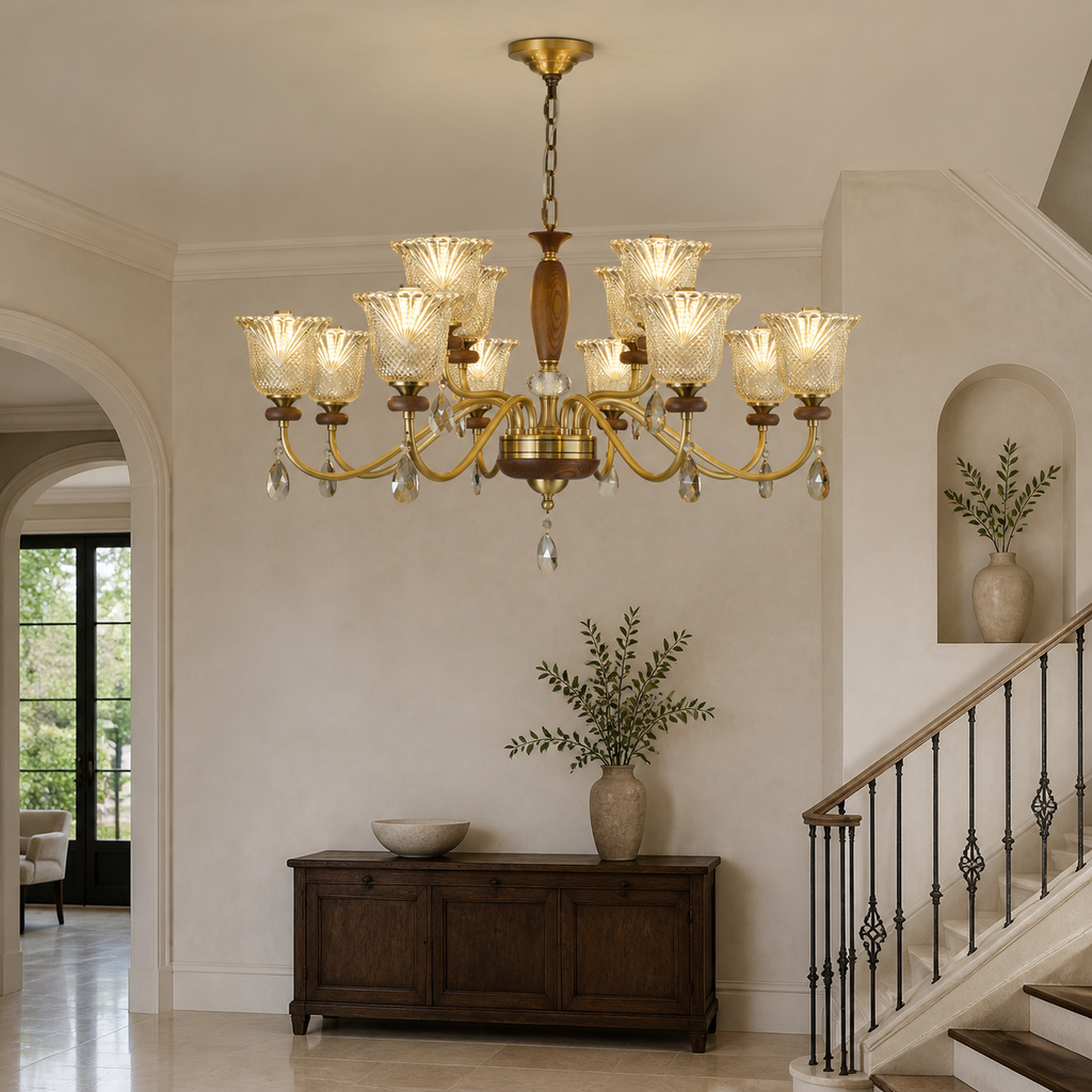 Cognelle eight plus four two-tier chandelier illuminated in a stair hall