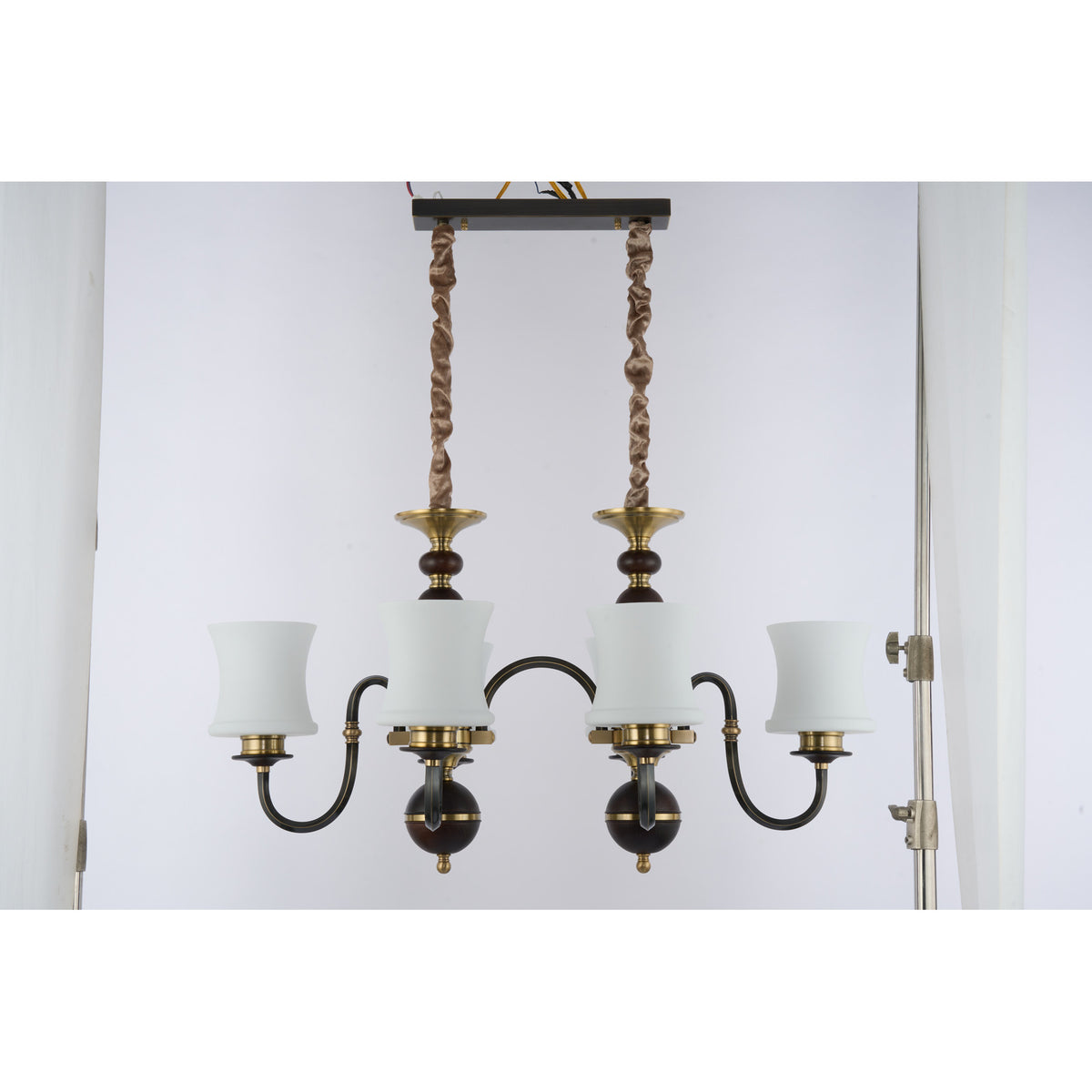 Supplier real photograph of the unlit Ebonelle six-light linear chandelier complete front view
