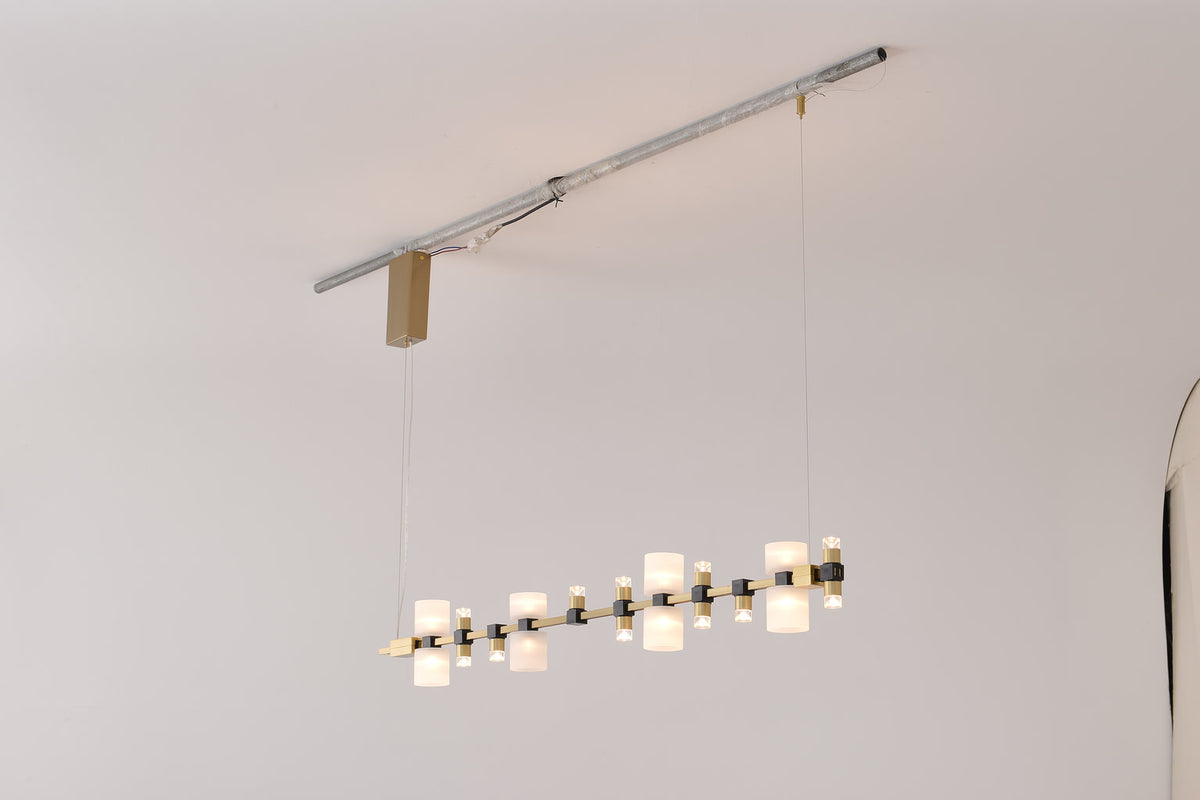 High-resolution real view of the Royal linear pendant rail and diffuser structure from an alternate angle