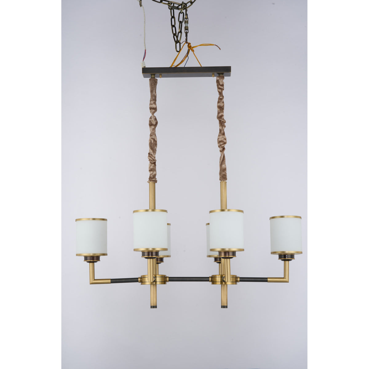 Supplier real photograph of the unlit Orseline six-light linear chandelier complete front view