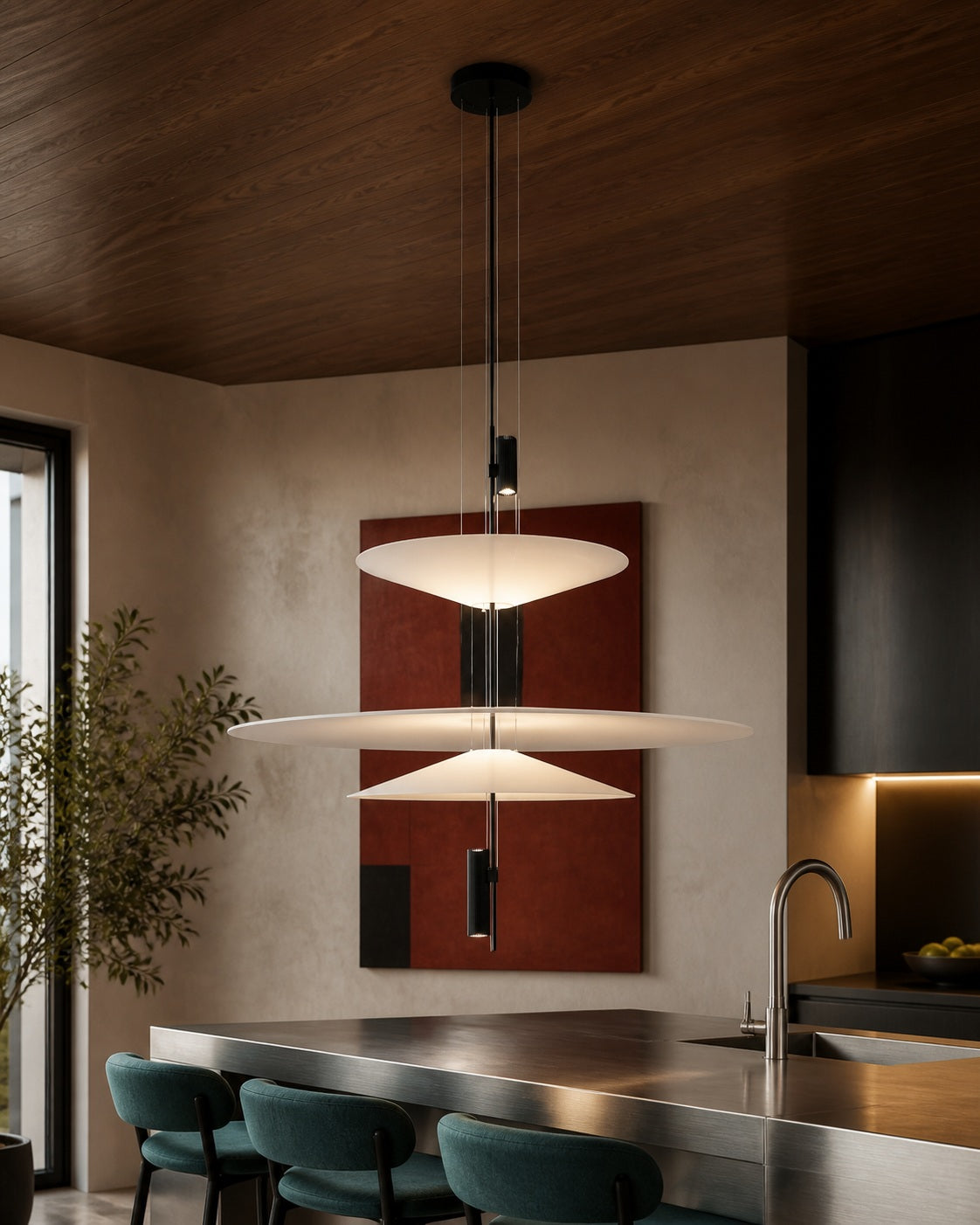 Three-tier layered acrylic disc pendant in a walnut and brushed-metal designer kitchen