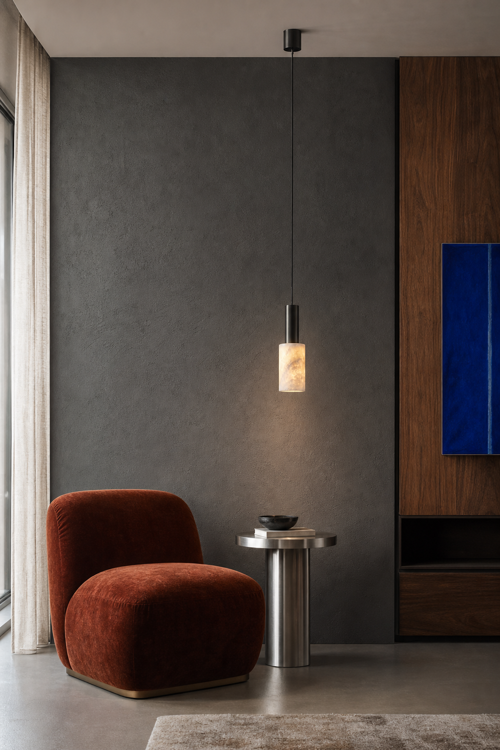 Azurelith Blue Crystal Cylinder Pendant Light in a chrome-accented modern lounge, black finish