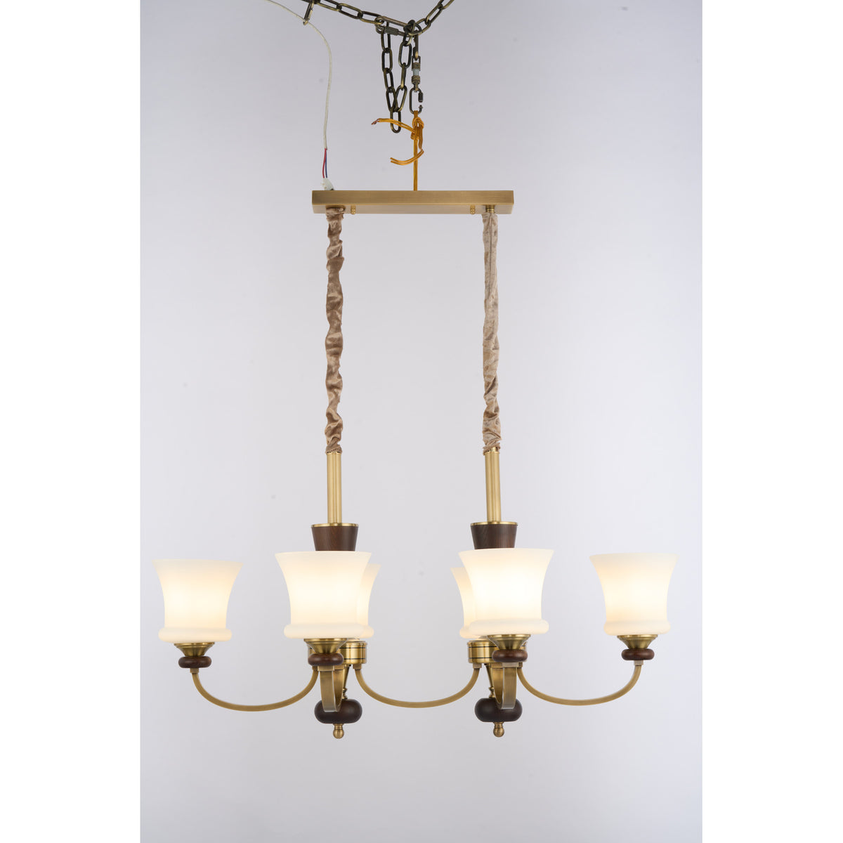 Caldrienne six-light linear chandelier front lit real product view