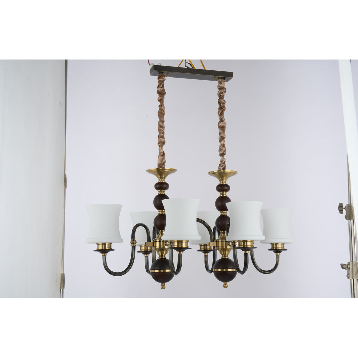 Supplier real photograph of the Ebonelle six-light linear chandelier three-quarter view