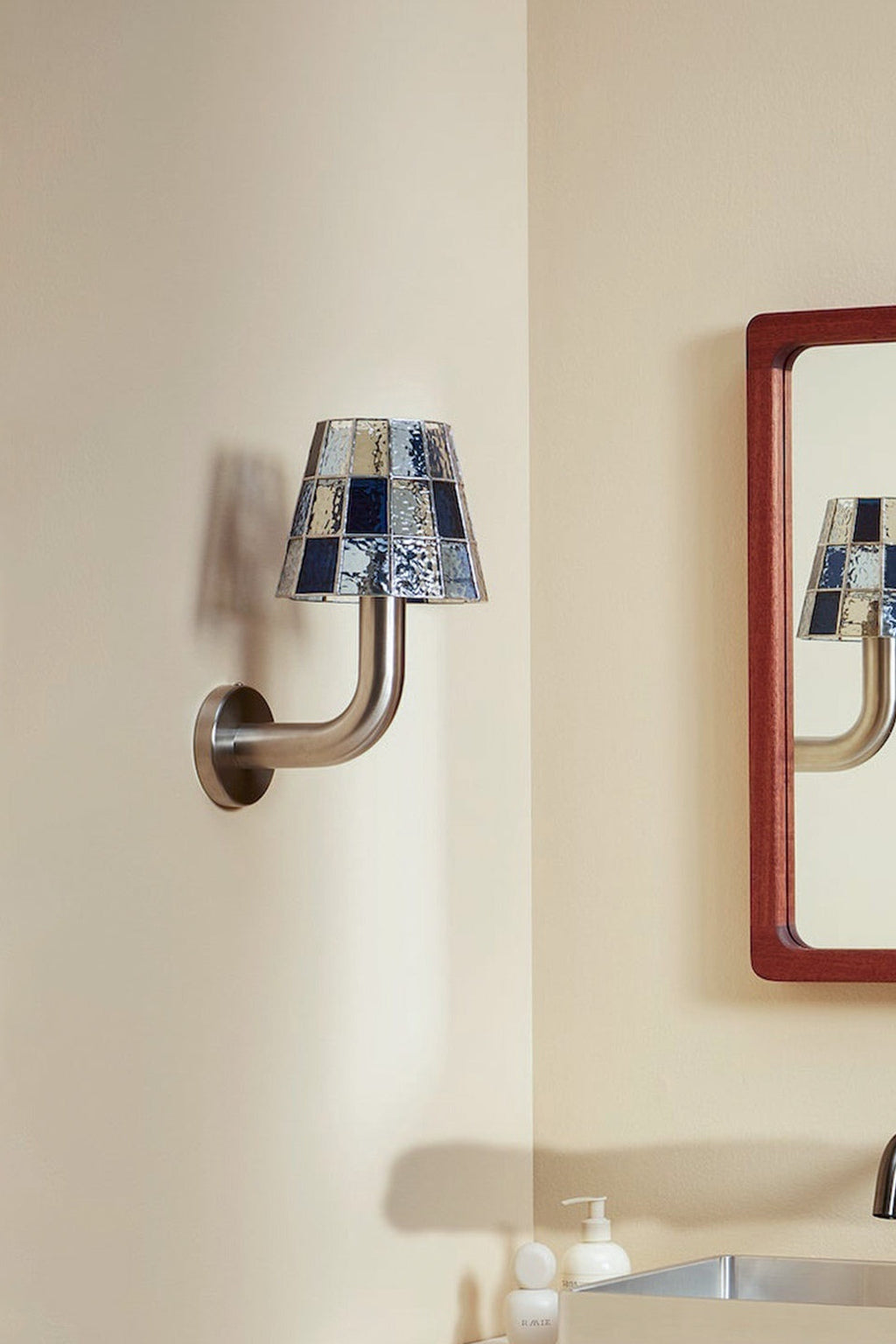 Textured Glass Long-Arm Wall Sconce — real long blue mirror daylight