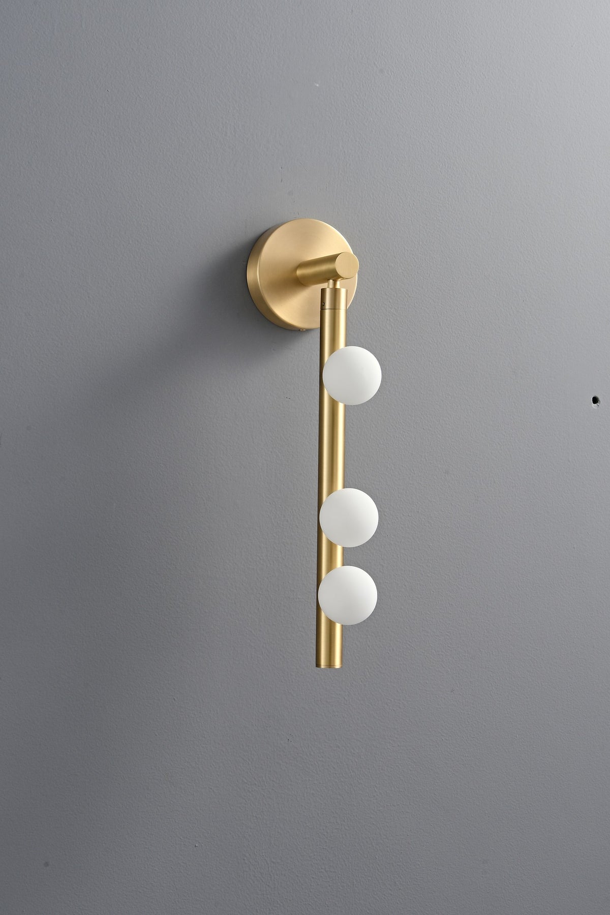 Modern Glass Globe Vertical Wall Sconce - 05 05-real-shot-brass-globe-vertical-wall-sconce-front