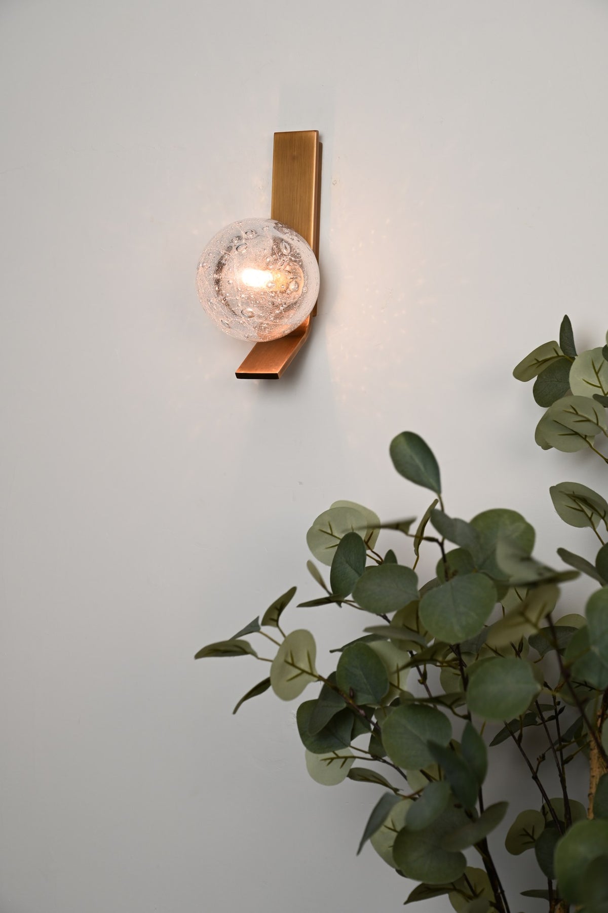Modern Glass Globe Wall Sconce in Antique Brass - 05 05-real-shot-glass-globe-wall-sconce-front