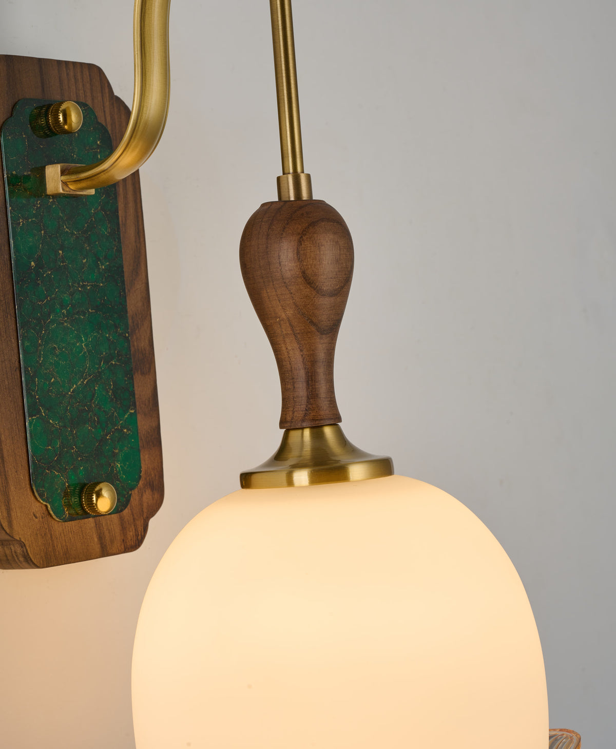 Supplier real detail 2 of the Virdelune rounded opal dome wall sconce