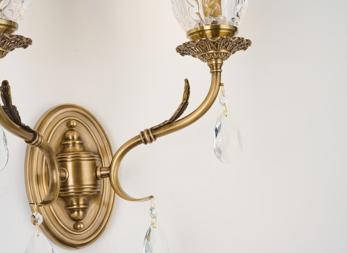Supplier real detail of the Vitrelaine oval wall plate and antique-brass-toned hardware
