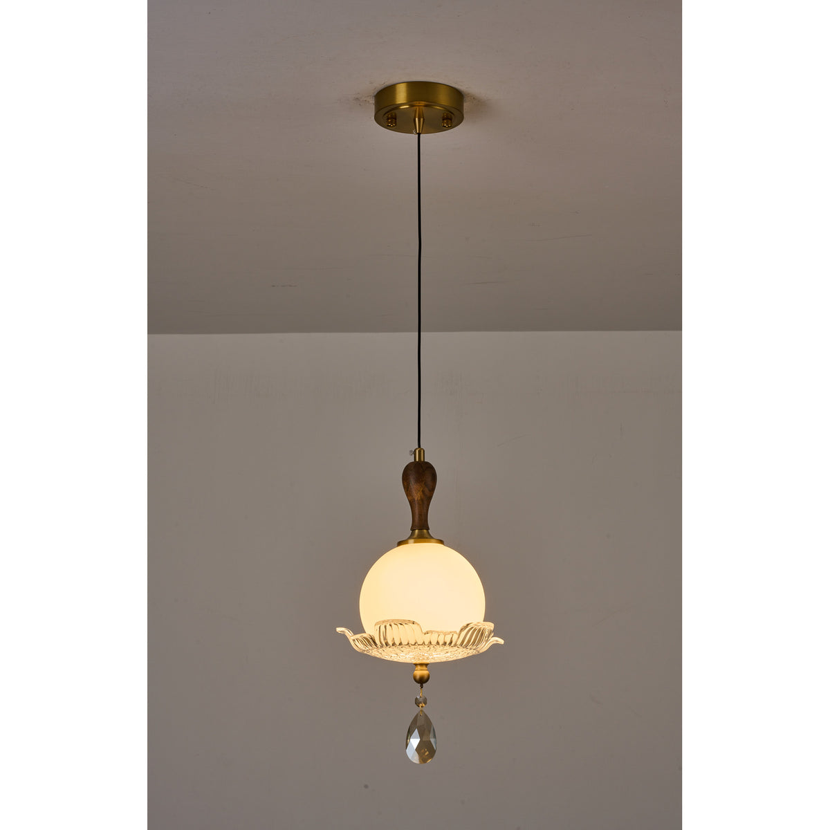 Supplier real photograph of Arabelle Pendant A angled view lit