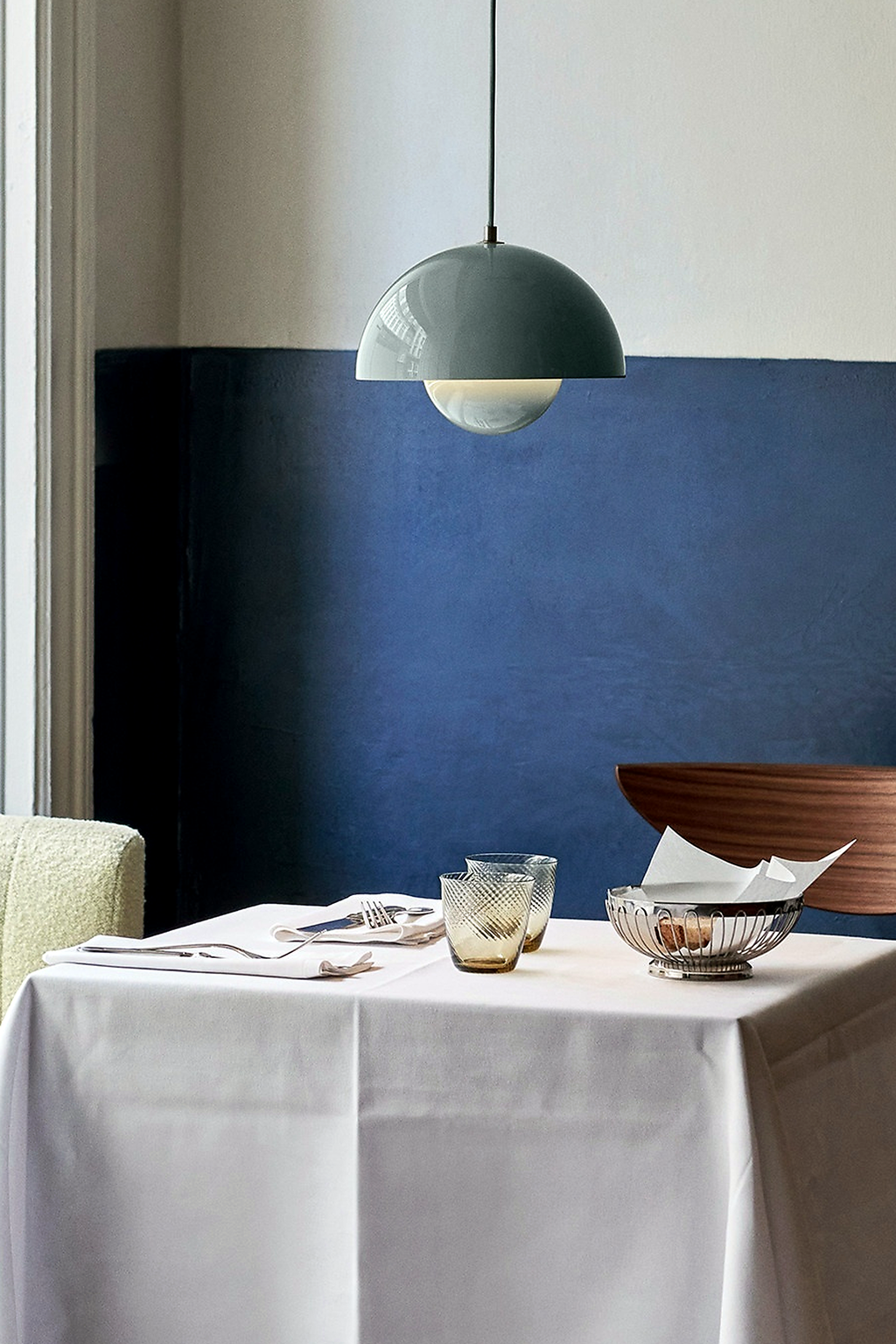 Blue Flowerpot Dome Pendant Light above a dining table