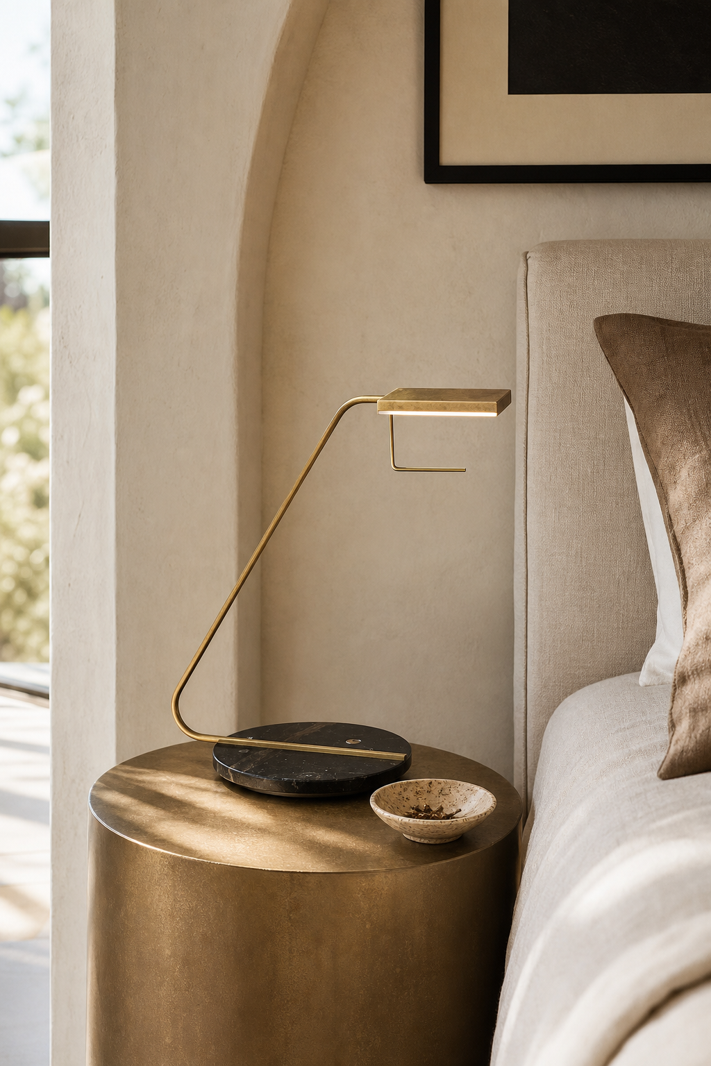 Antique Brass Marble LED Table Lamp illuminated in a warm evening interior