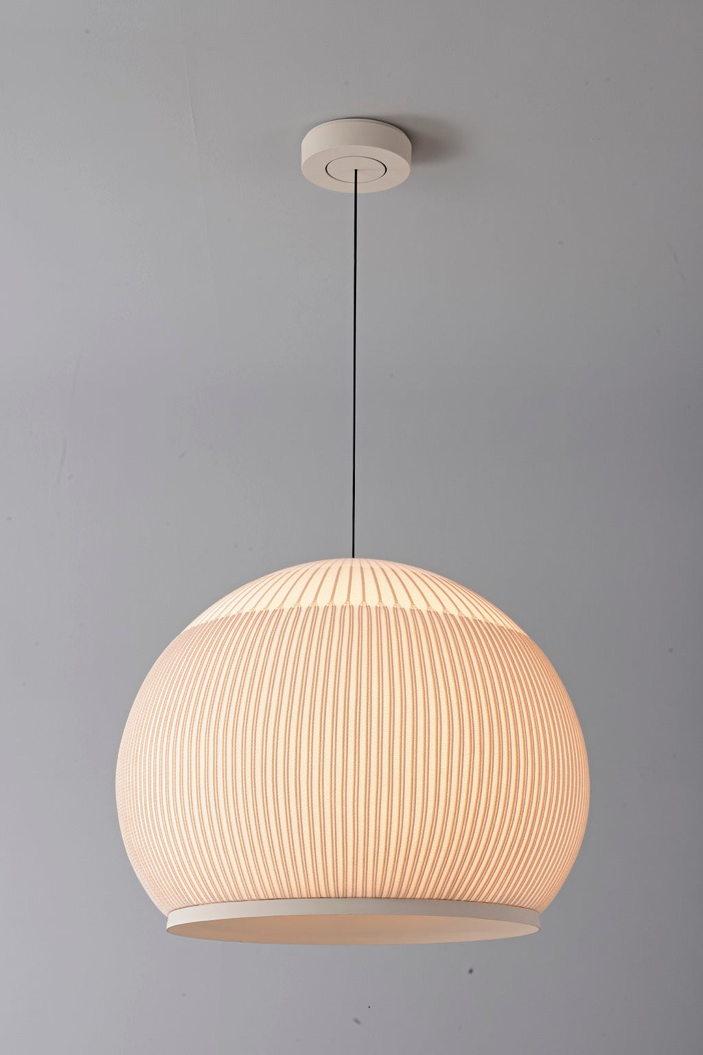 Modern Ribbed Dome Pendant Light — complete rounded shade illuminated