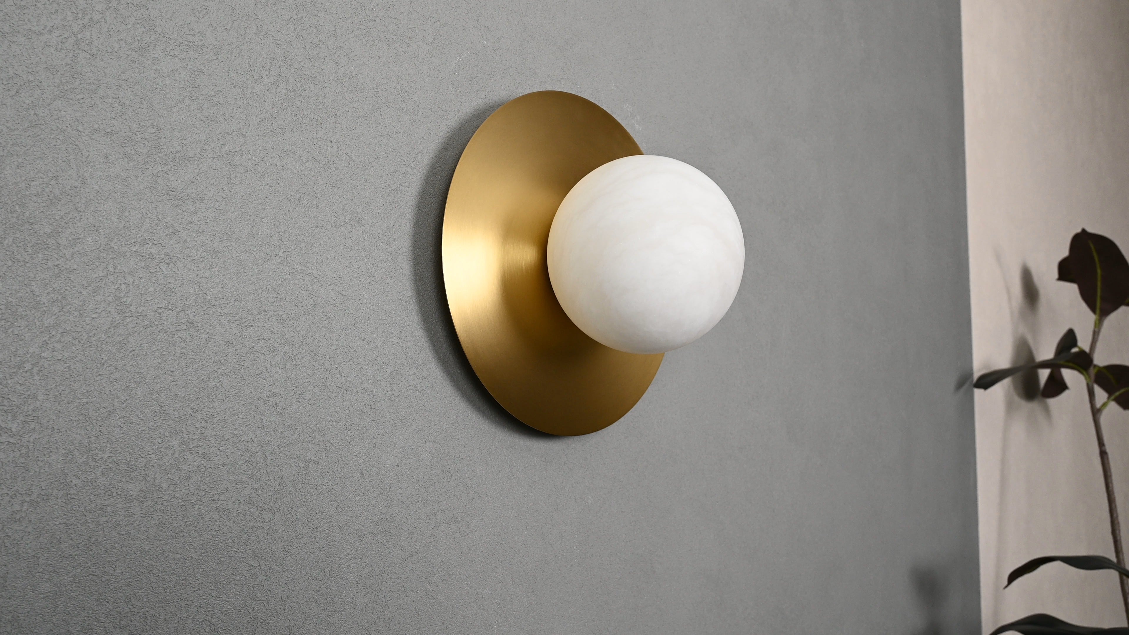 Modern Alabaster Globe Wall Sconce in Natural Brass - 06 06-real-angle-off